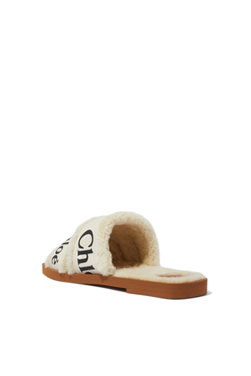 Woody Shearling Flat Mules in Canvas