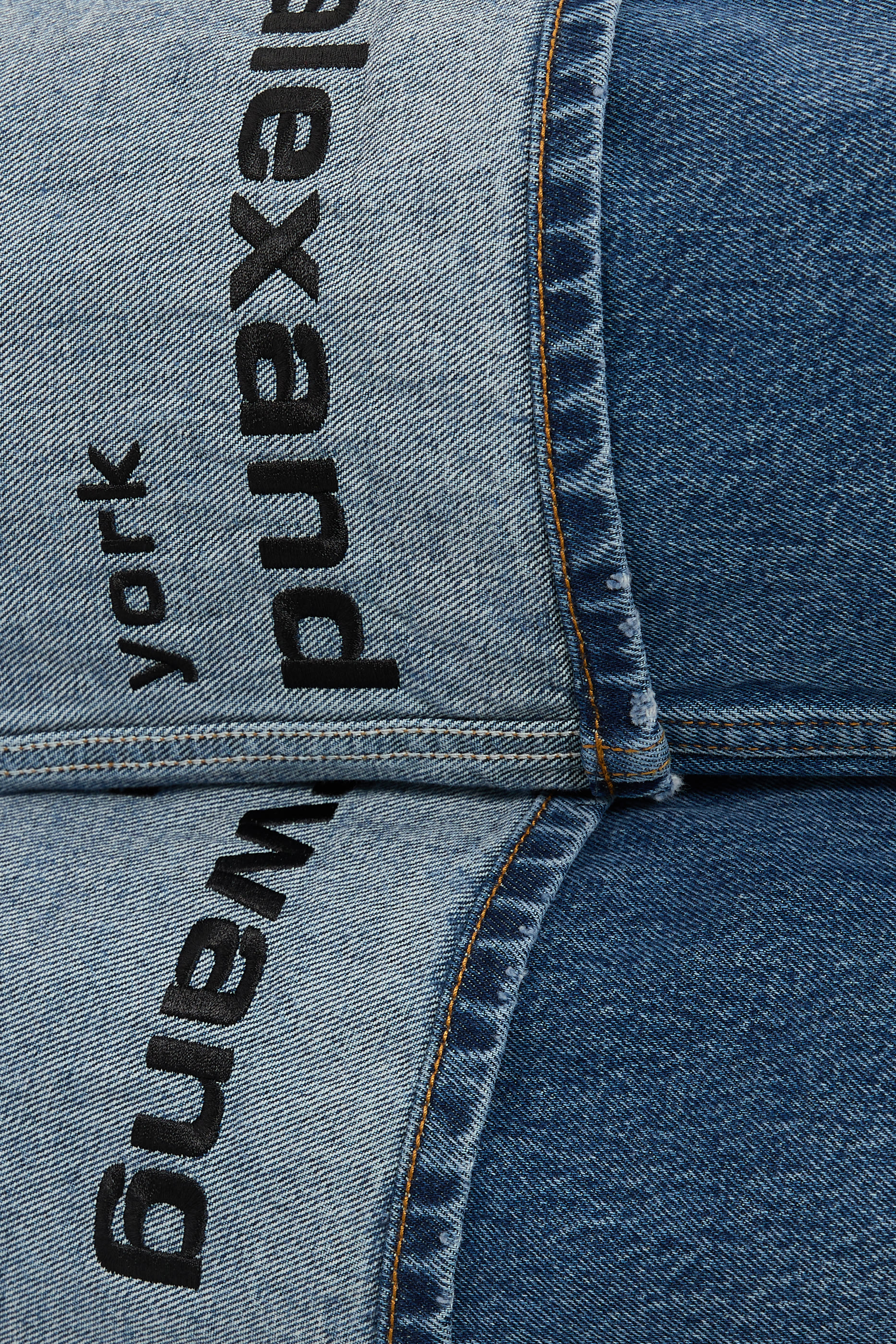 Logo Embroidered Mid Rise Jeans 