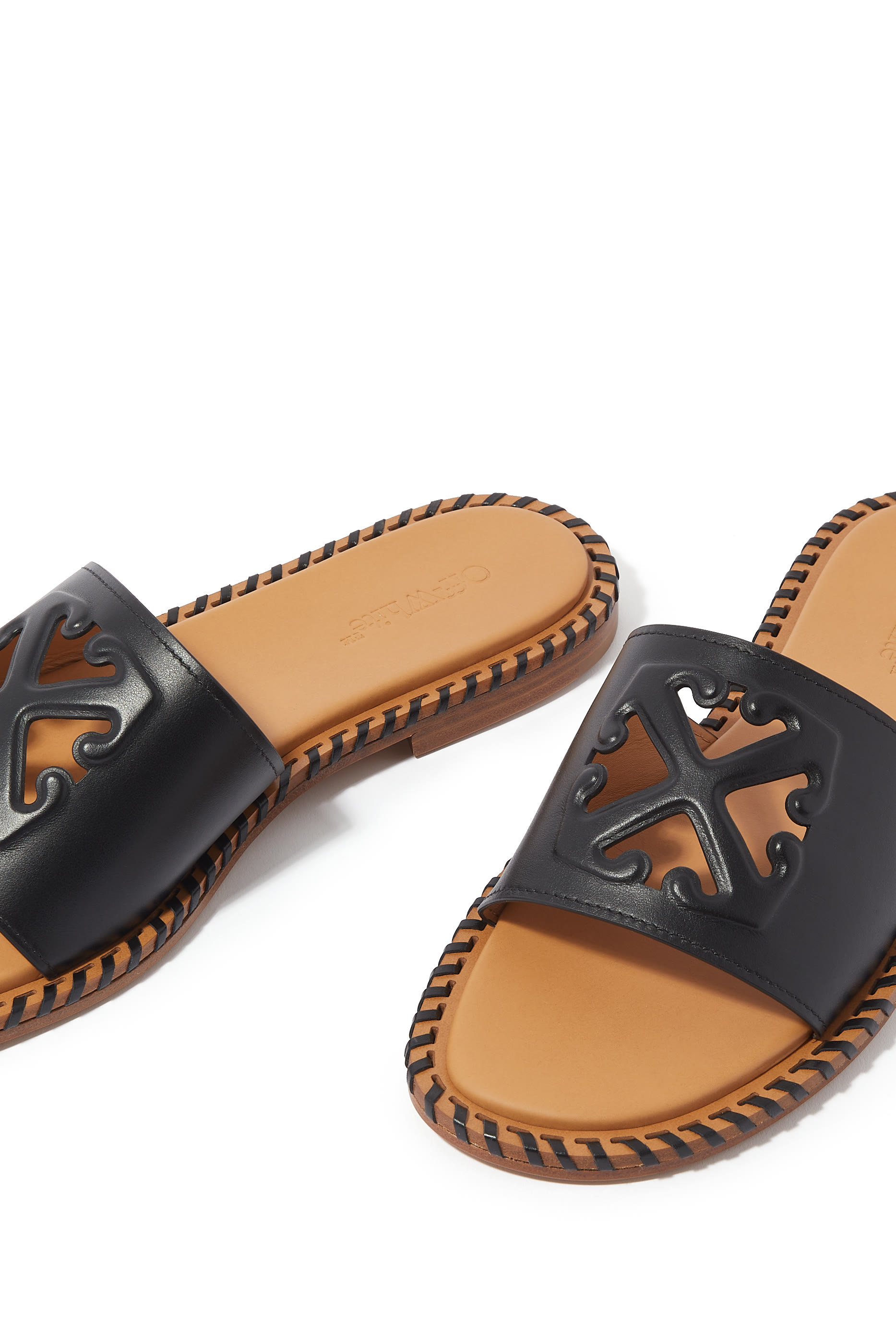 Twist Embossed Arrow Leather Slides