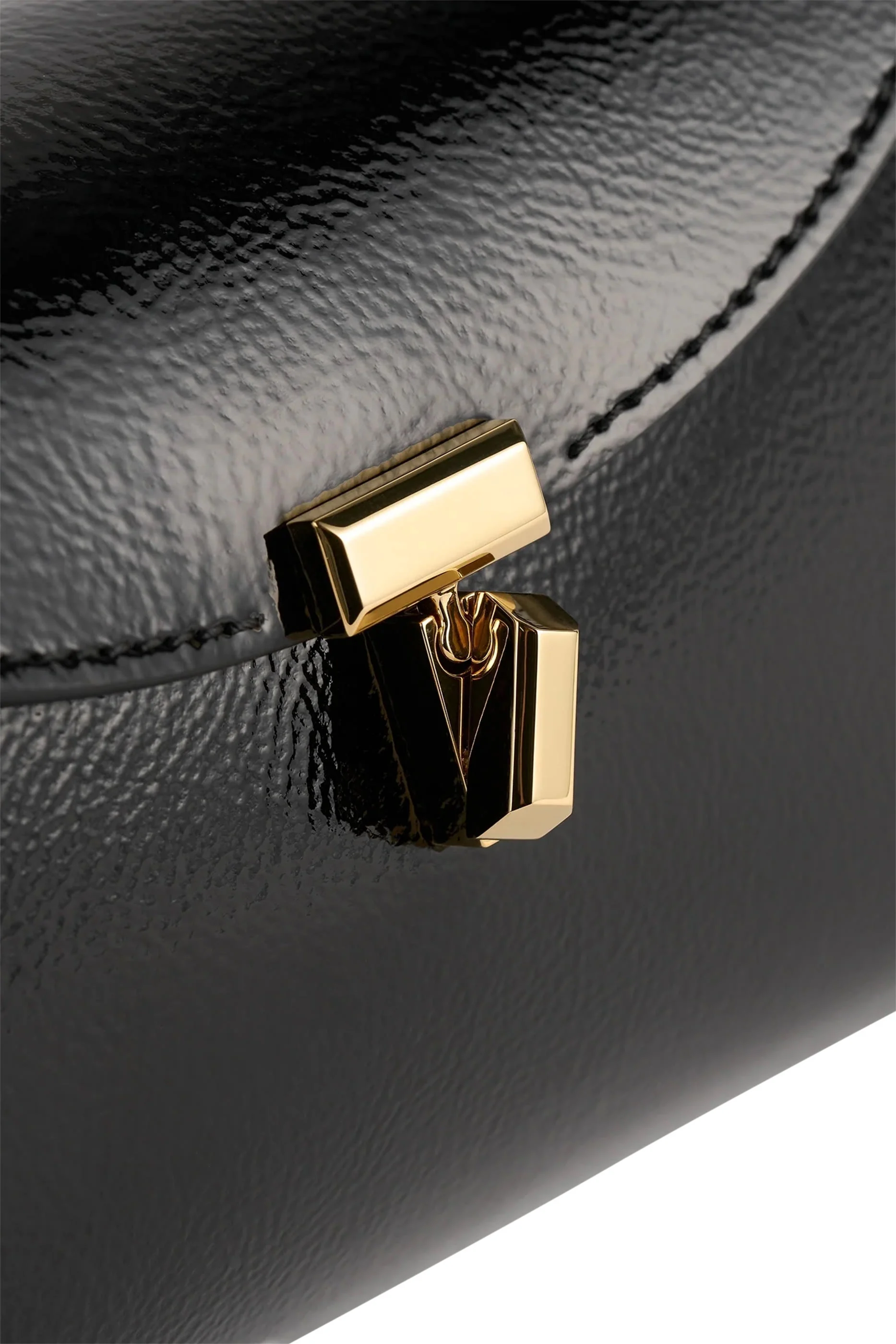 Mini T-Lock Naplack Clutch