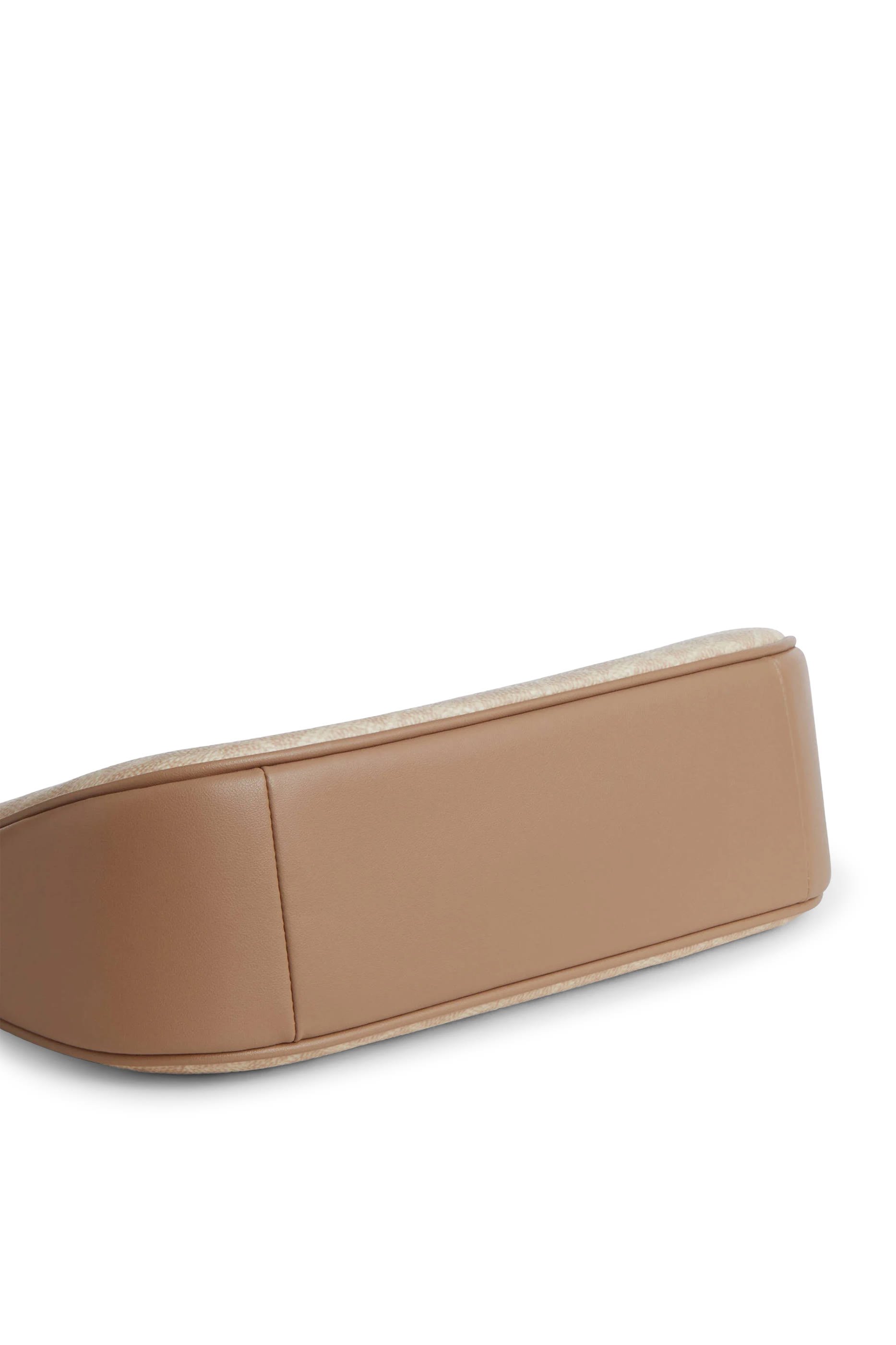 Teri Mini Crossbody Bag in Signature Canvas