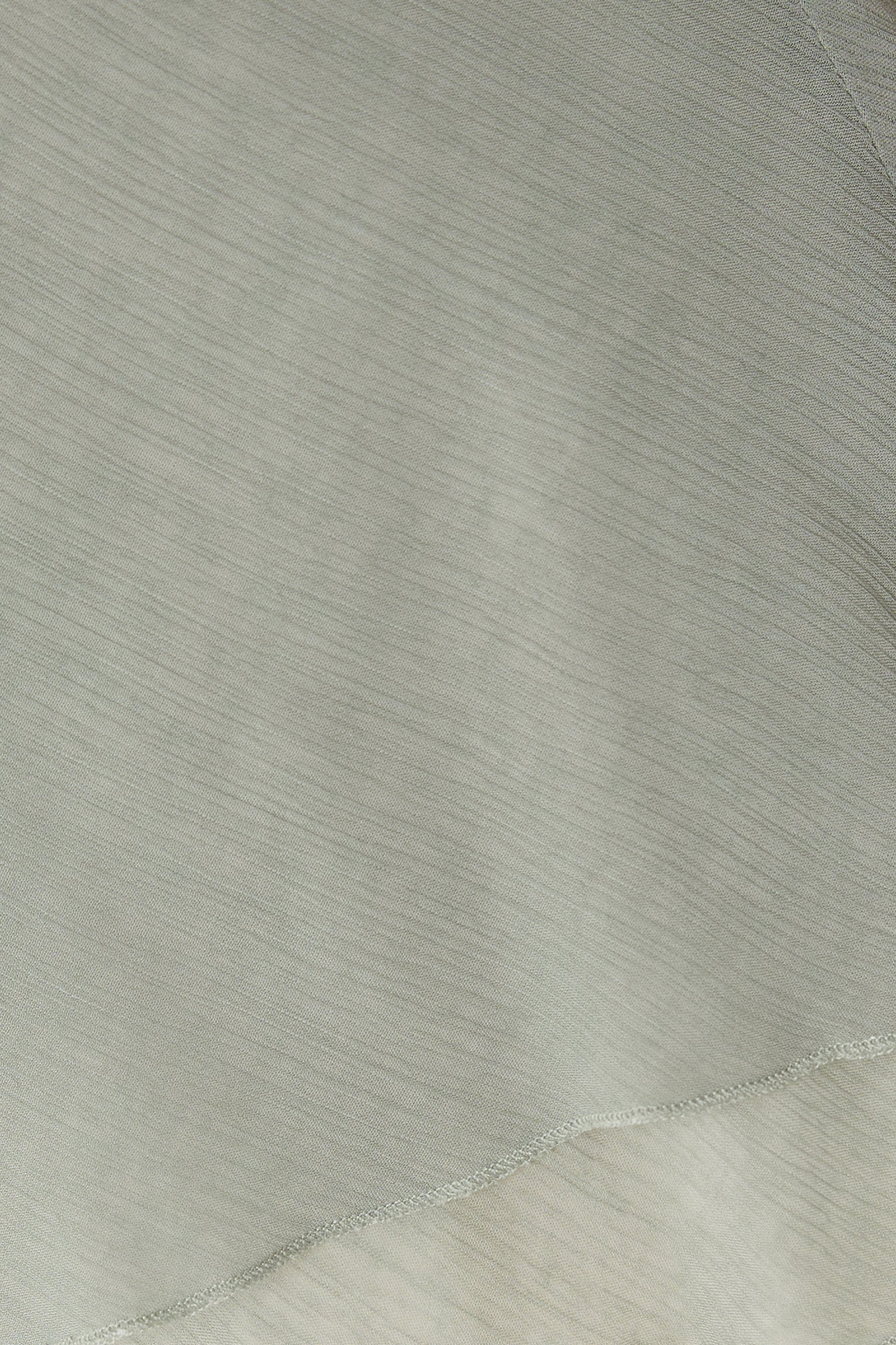 Sleeveless High-Neck Top