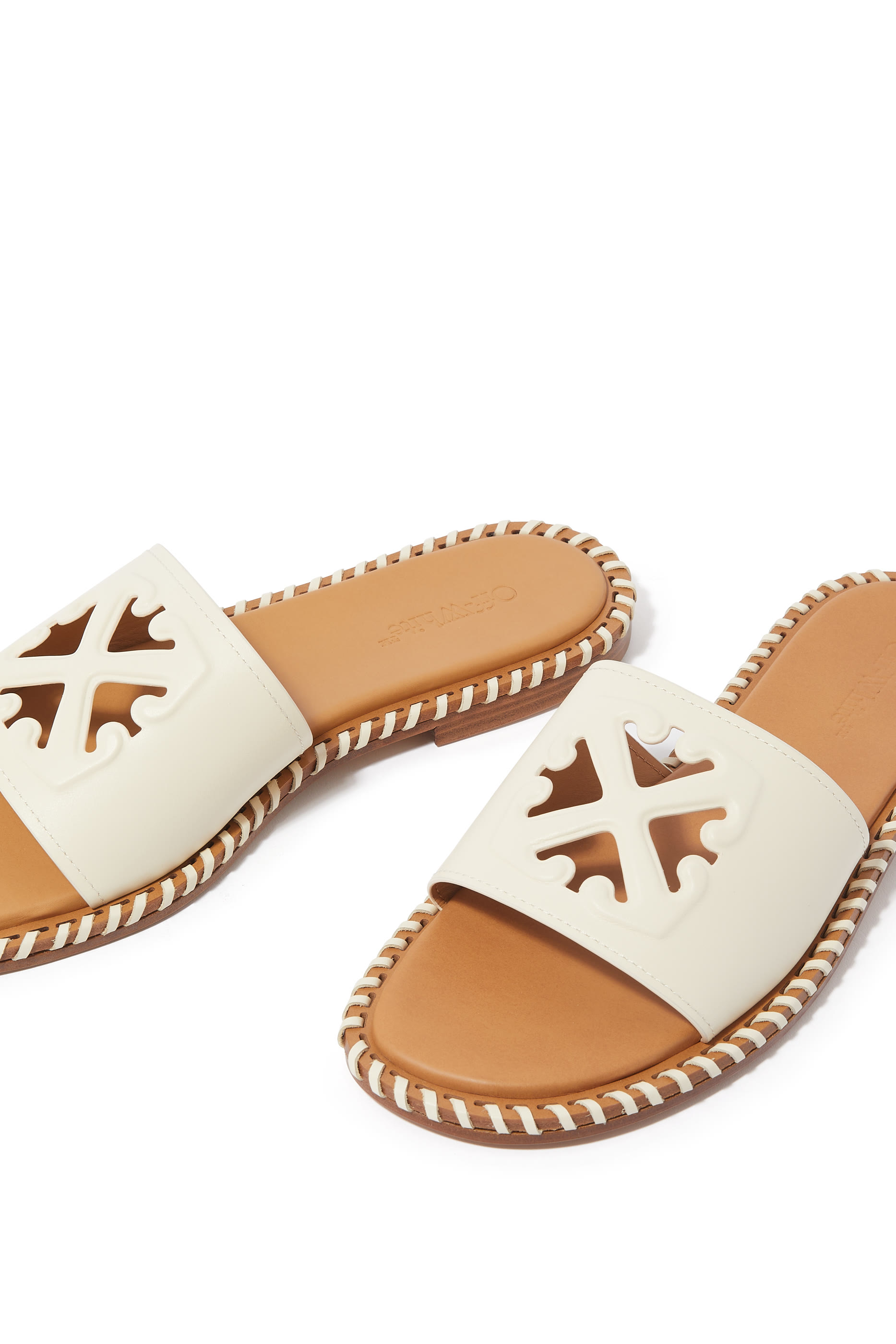 Twist Embossed Arrow Leather Slides