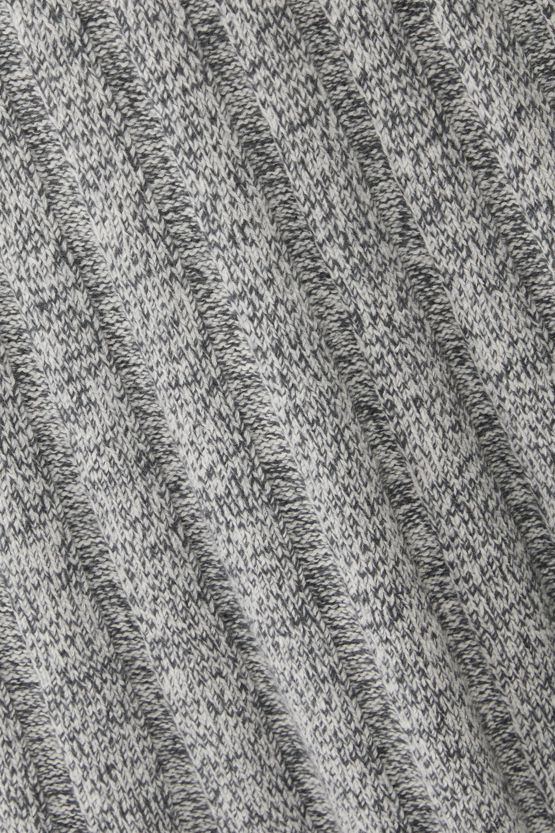 The Pleated Midi Skirt