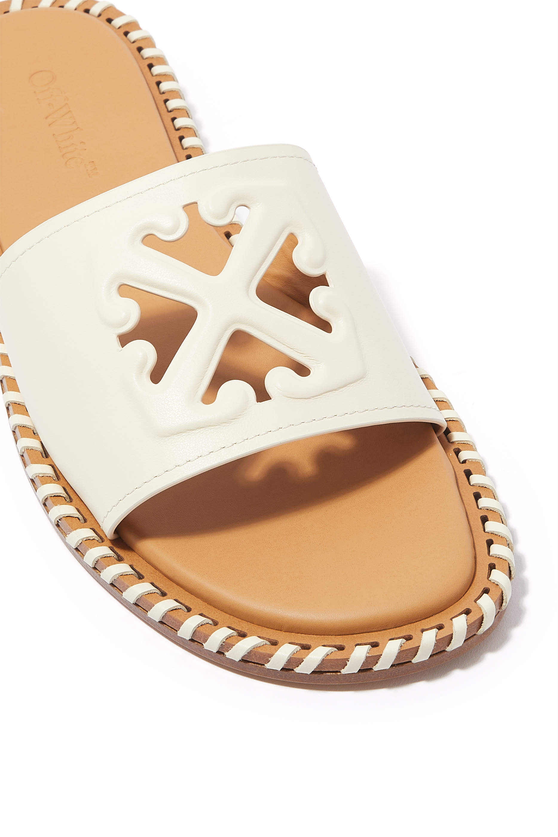Twist Embossed Arrow Leather Slides