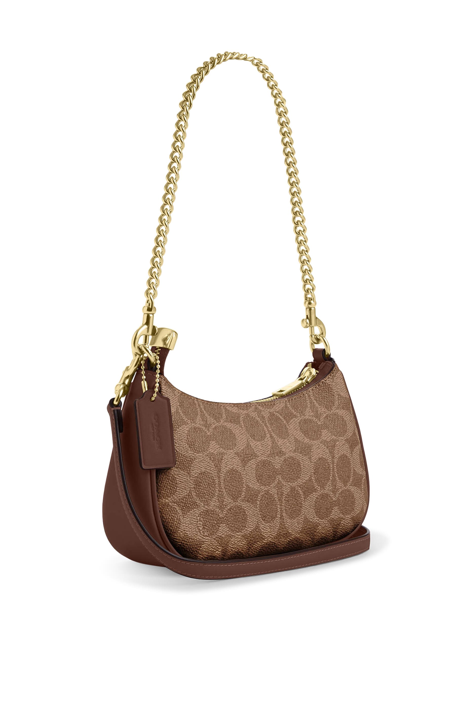 Teri Mini Crossbody Bag in Signature Canvas